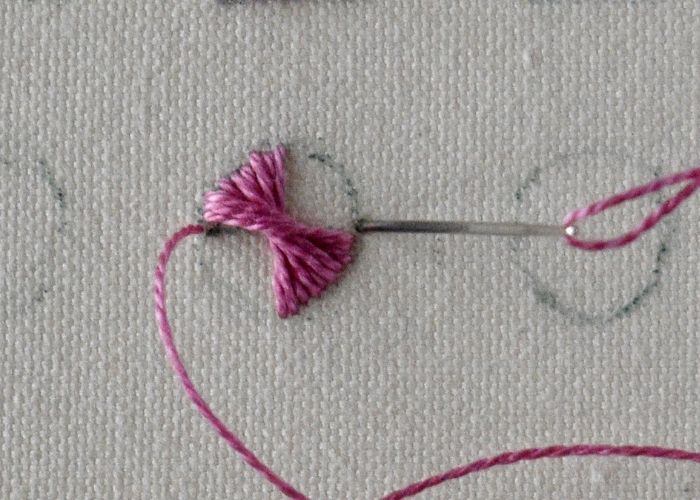Rhodes stitch embroidery in a round shape