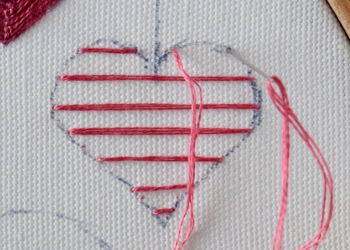 Burden stitch heart embroidery horizontal lines