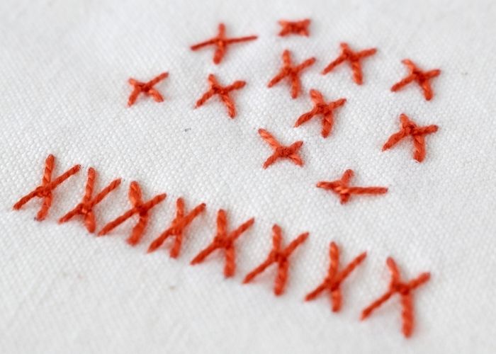 Sienese Stitch embroidery sampler with red pearl cotton thread image